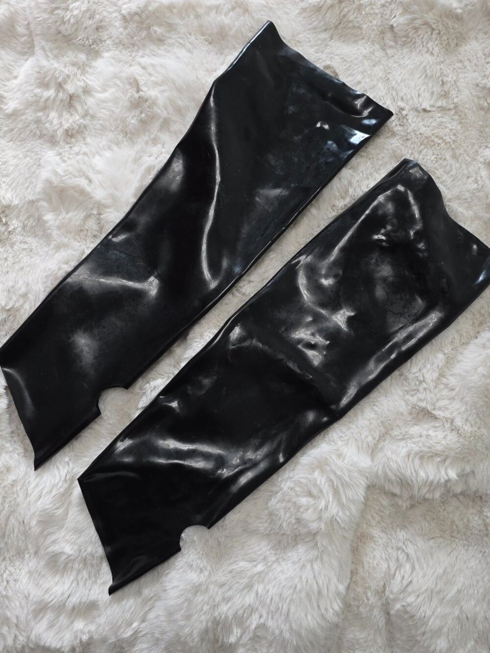Black latex elbow length fingerless gauntlets